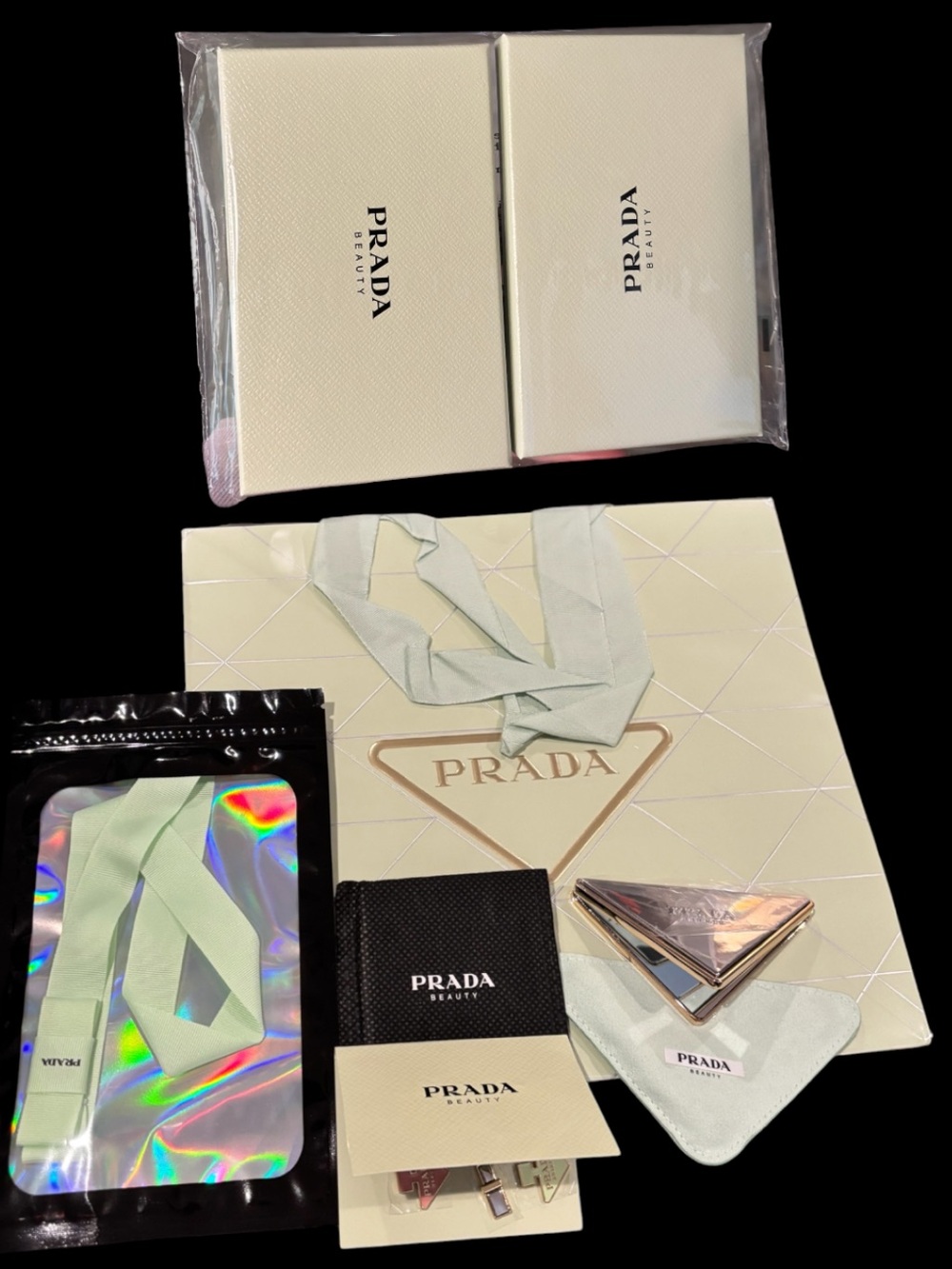 Prada Beauty Set – mirror, charms, & all shown